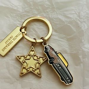 Coach dream sunset keychain